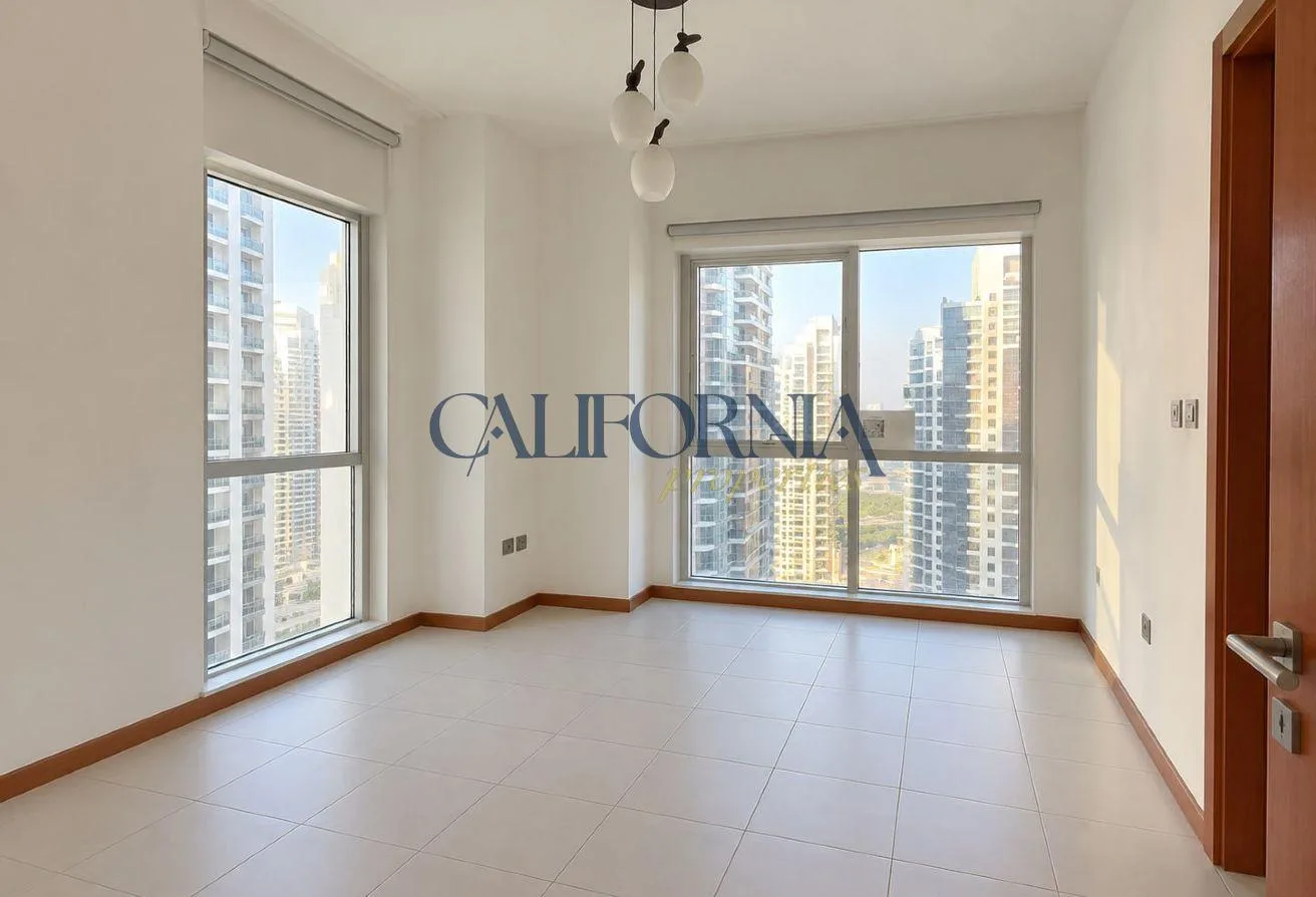 High-Floor 1BR | City & Lake View | Unfurnished - 1